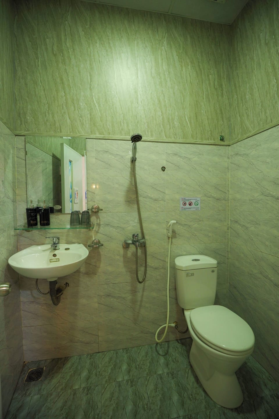 Quadruple Room | Bathroom | Shower, free toiletries, hair dryer, slippers