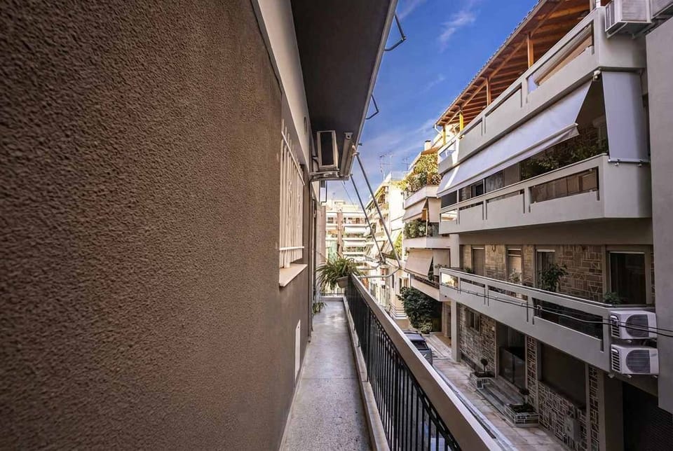 Narrow balcony with open sky views, creating a refreshing outdoor corner ideal for quiet breaks between adventures.
