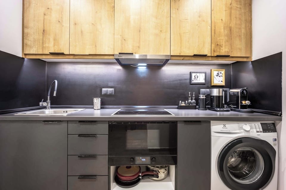 Fully equipped kitchen with modern appliances and everything you need for home-cooked meals—guests love how spotless and practical this space is