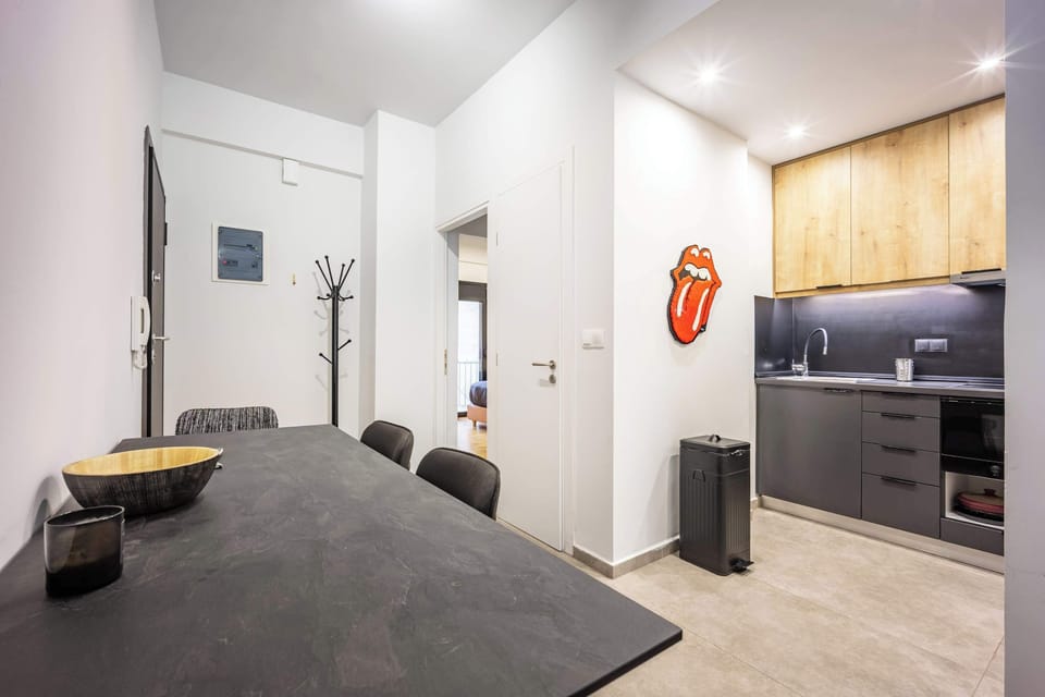 Comfortable dining space ideal for shared meals . Guests enjoy how connected it feels to both the kitchen and the rest of the home.