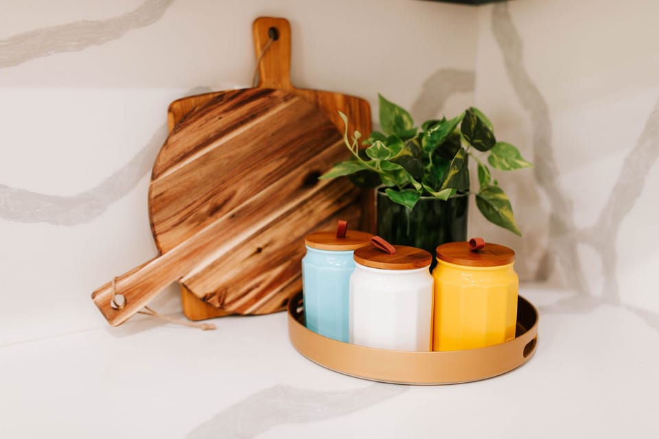 Start your day in a kitchen that’s as vibrant and welcoming as your morning mood—complete with stylish canisters and natural touches!