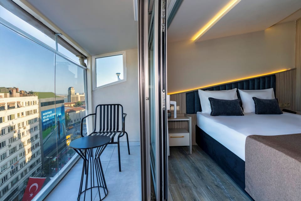 Deluxe Studio Suite, 1 Double Bed, City View | In-room safe, desk, soundproofing, iron/ironing board