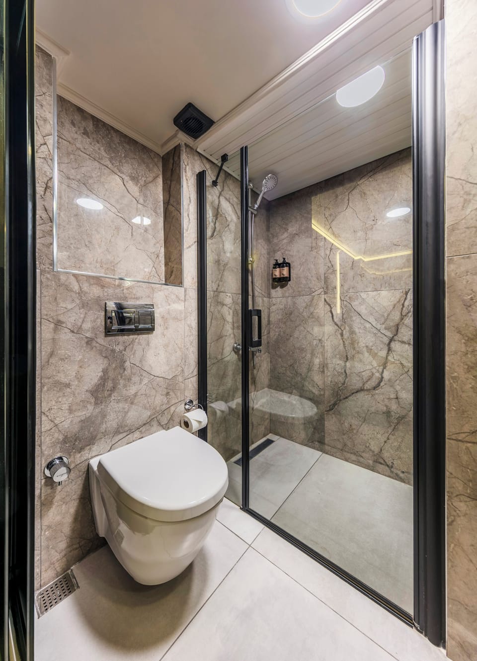 Shower, hair dryer, slippers, towels