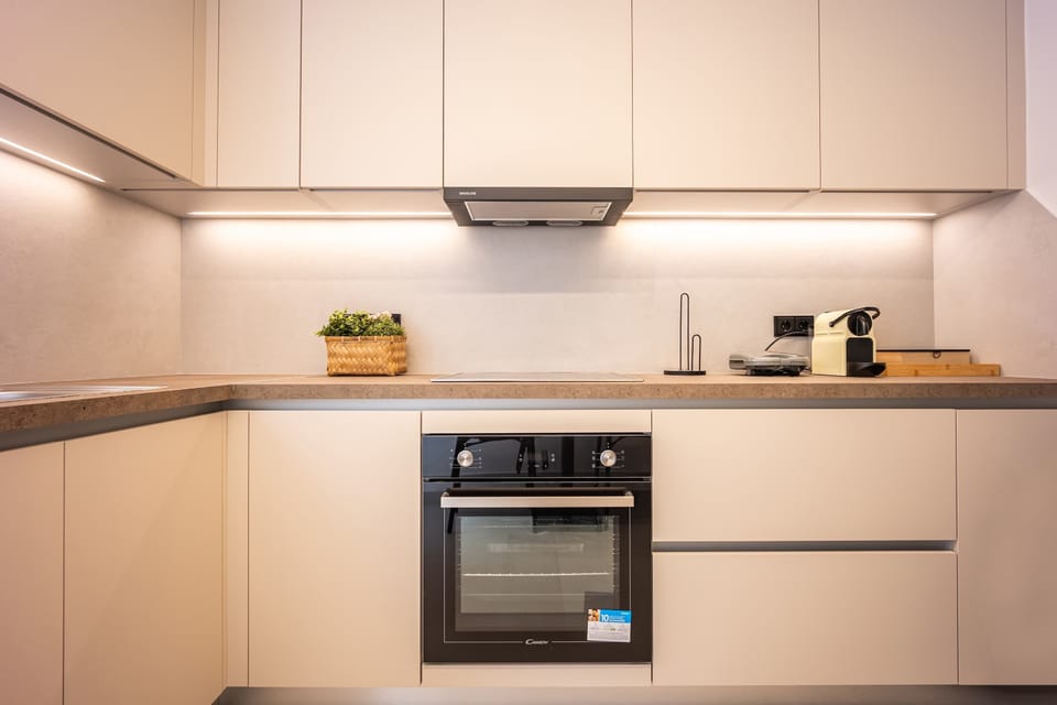 Warm wood, subtle lighting, and thoughtful details create a welcoming space for daily rituals and comfort.