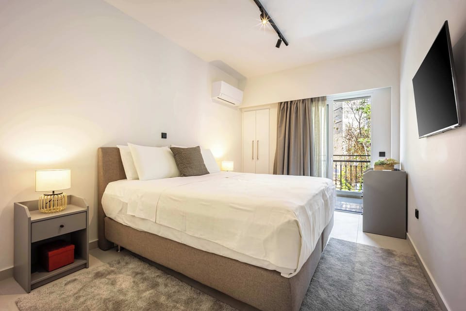 Very comfortable king bed ideal for restful nights in Athens