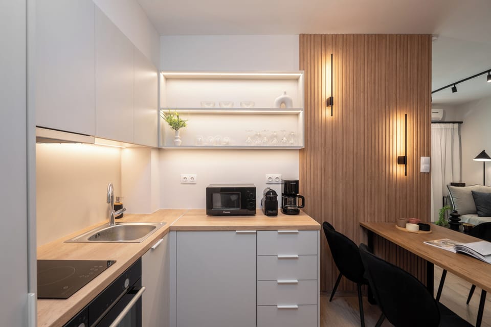 Design Apartment, City View | Private kitchen | Full-size fridge, microwave, oven, stovetop