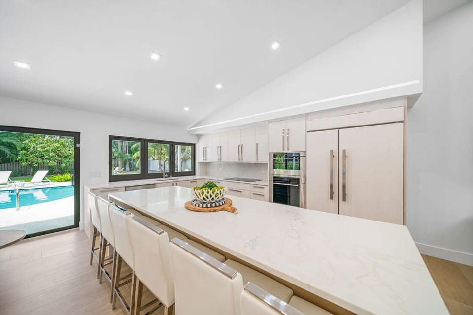 Large, fully stocked kitchen with Wolf appliances and Sub Zero fridge/ freezer