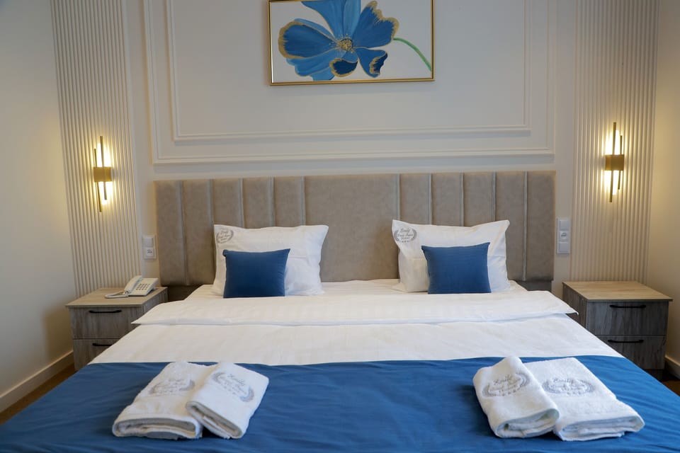 Comfort Double Room, City View | In-room safe, desk, laptop workspace, blackout drapes