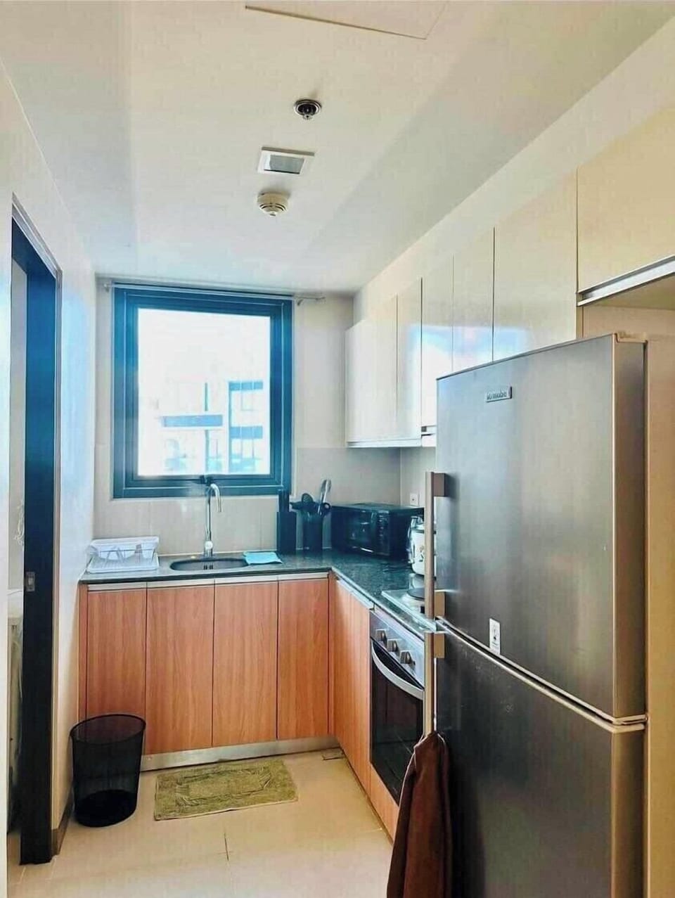 Deluxe Condo, Balcony | Private kitchen | Fridge, oven, stovetop, dishwasher