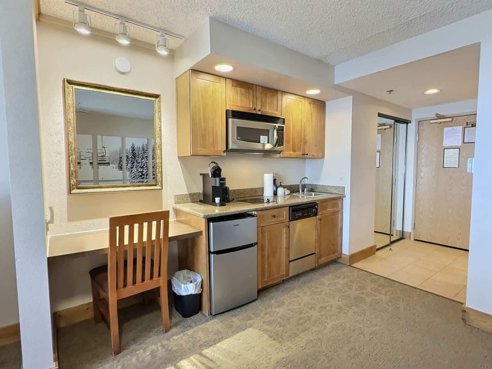 Kitchenette in Room | Listed with @BookTraverse