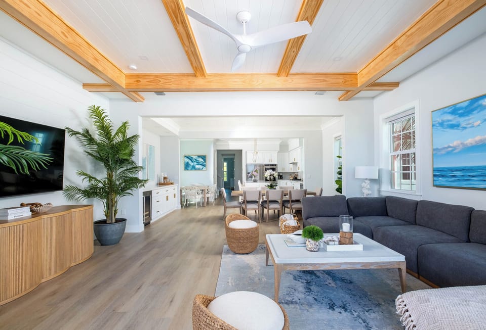Coastal elegance and cozy comfort blend perfectly in this family retreat