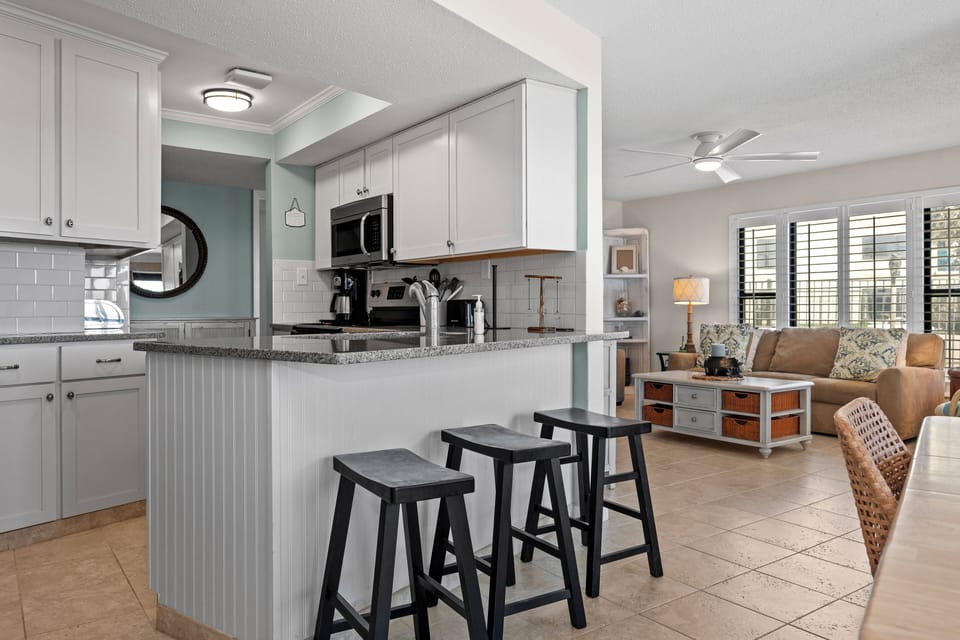 Your open-concept kitchen flows seamlessly into the living area, perfect for preparing meals while staying connected with loved ones.