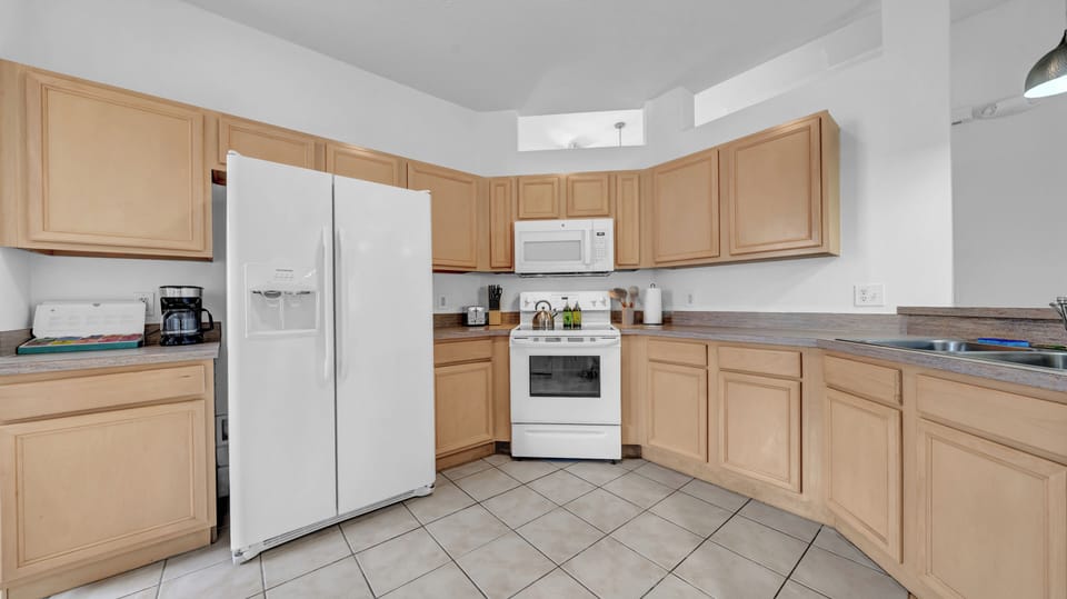 Fully stocked kitche with everything you need to cook, gather and enjoy!