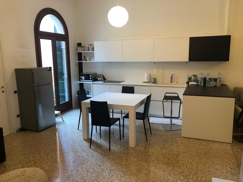 Apartment, Garden View | Living area | Flat-screen TV