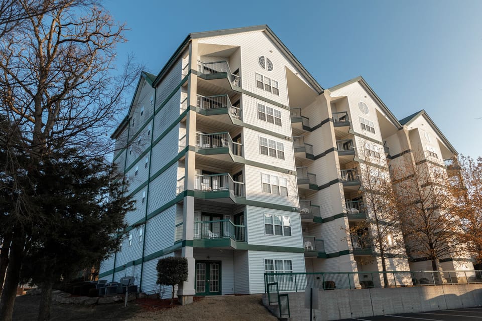 Six-story building exterior — elevator access brings you directly to your floor