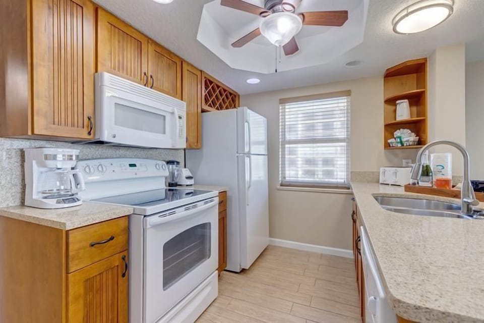The modern kitchen features all the essentials, making family meal preparations a breeze.