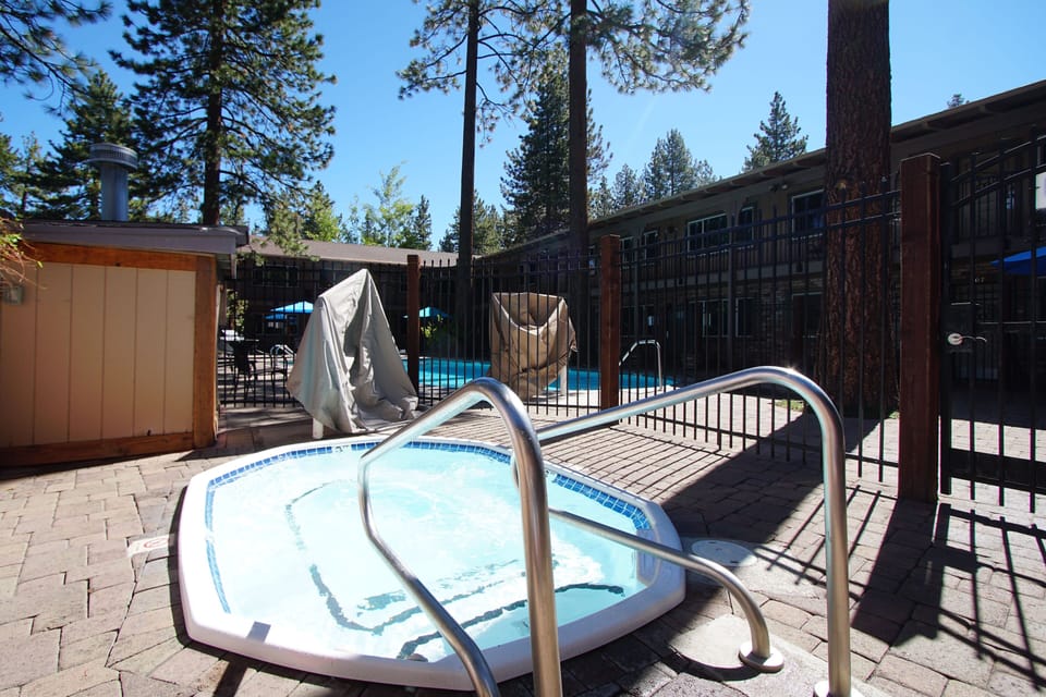 Relaxing hot tub near the poolside
