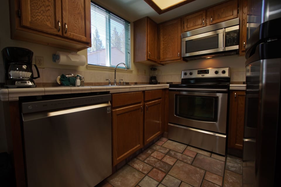 Modern kitchen featuring stainless steel appliances
