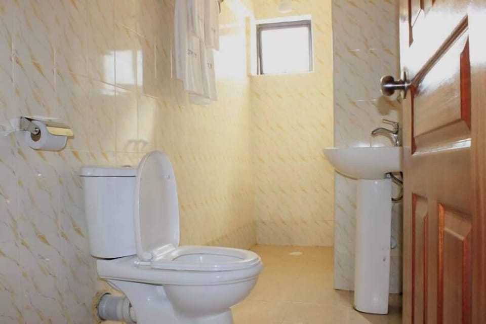 Shower, slippers, towels, soap