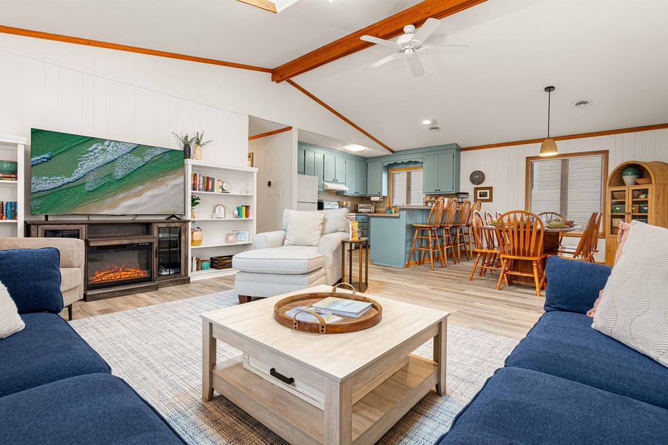 The entire home embraces an open design, creating a sense of spaciousness and connection.