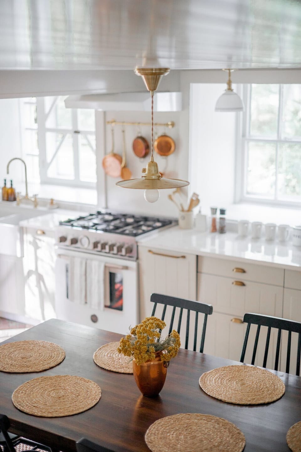 Modern kitchen with quartz counters + seating for 6