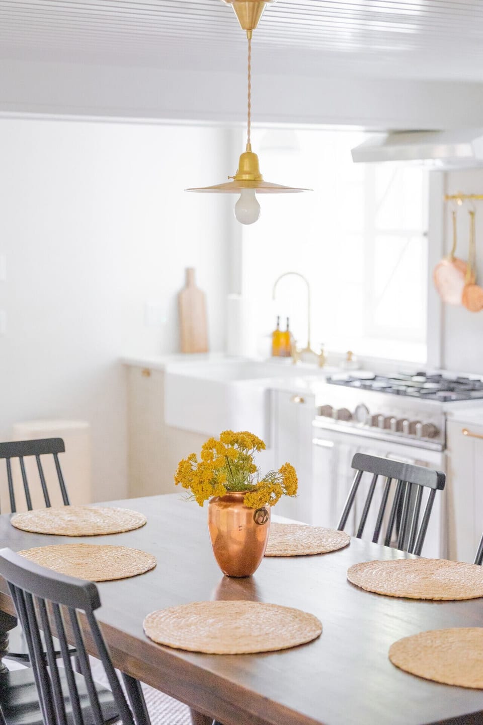 Modern kitchen with quartz counters + seating for 6