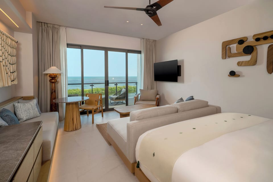 Premium bedding, down comforters, minibar, in-room safe