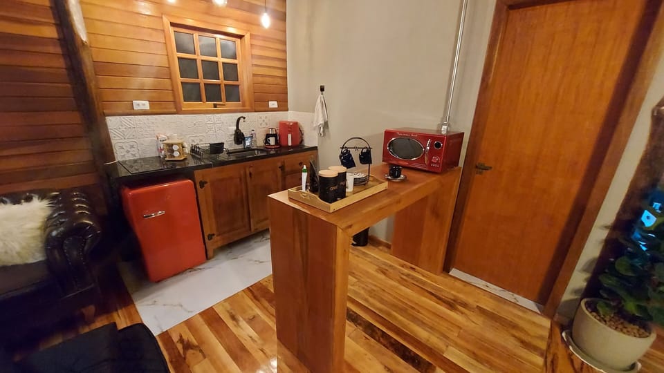 Deluxe Chalet, Kitchenette, Mountain View | Private kitchen | Mini-fridge, microwave, stovetop, cookware/dishes/utensils
