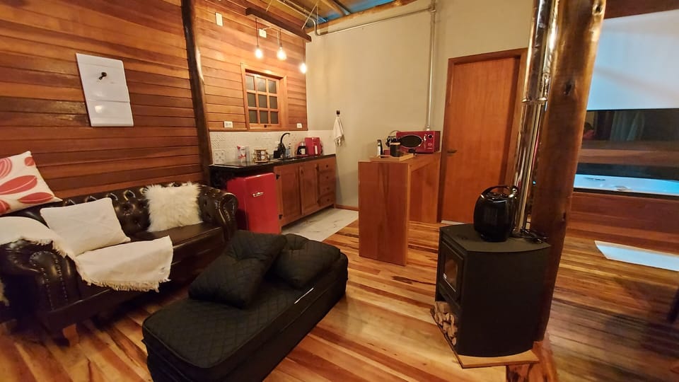 Deluxe Chalet, Kitchenette, Mountain View | Living room | TV