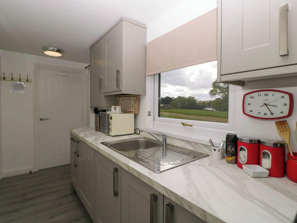 Fridge, microwave, toaster, cookware/dishes/utensils