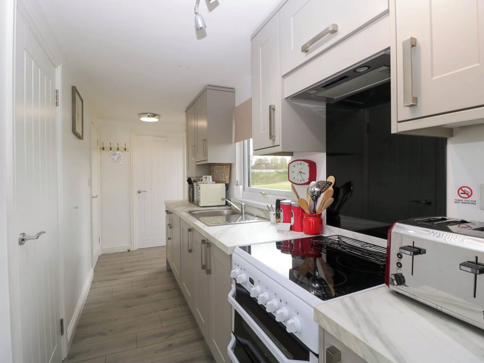 Fridge, microwave, toaster, cookware/dishes/utensils