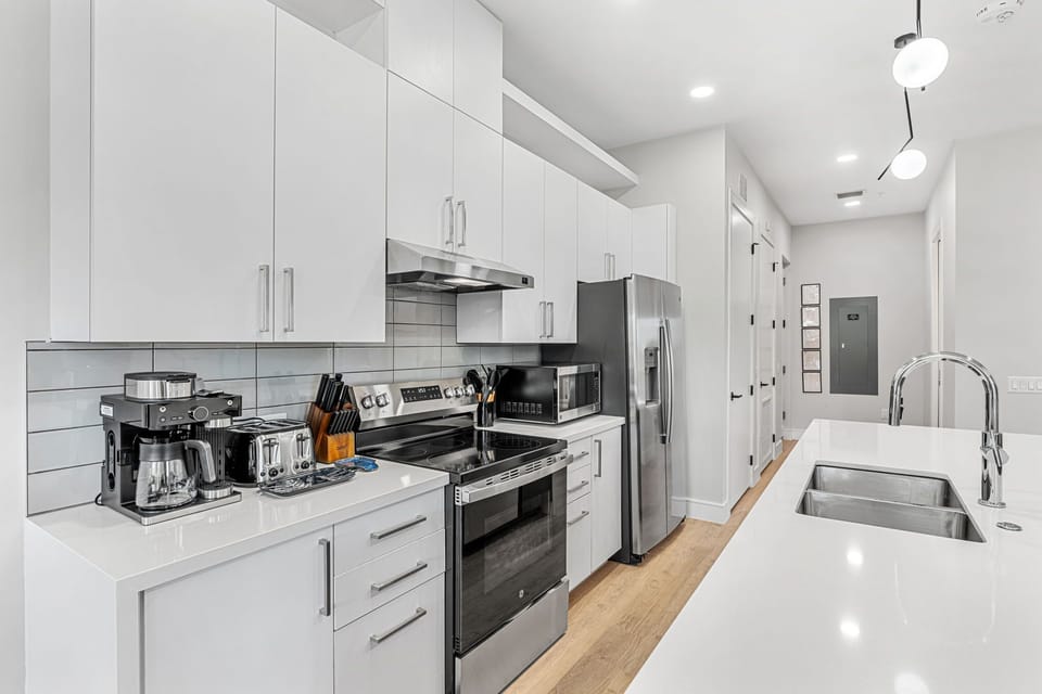 A full kitchen setup makes cooking at home easy and convenient.

