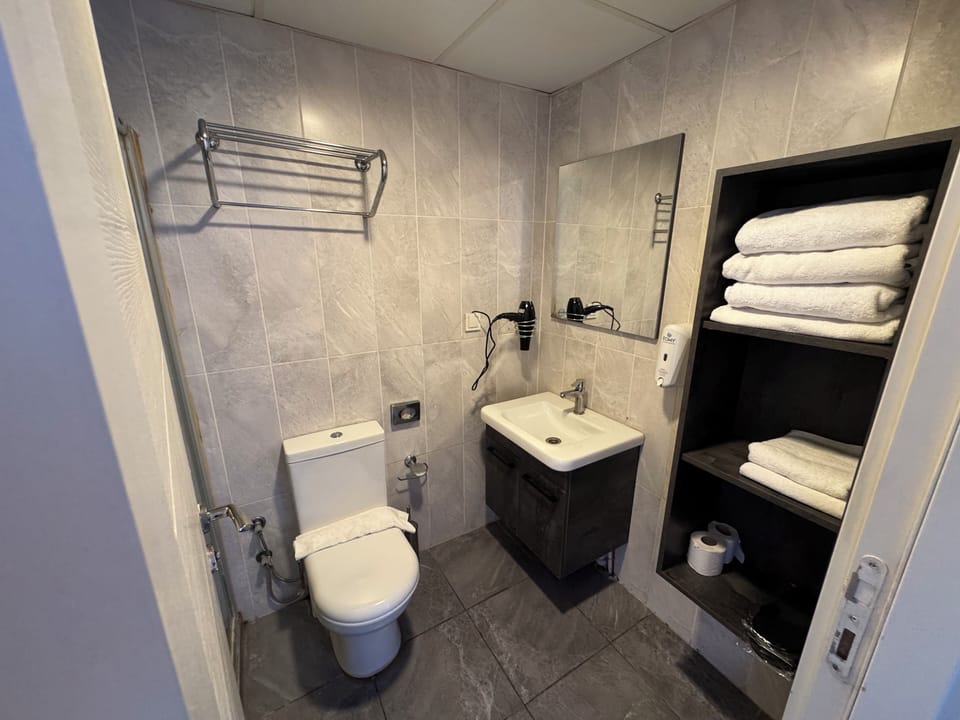 Family Condo | Bathroom | Hair dryer, slippers, towels