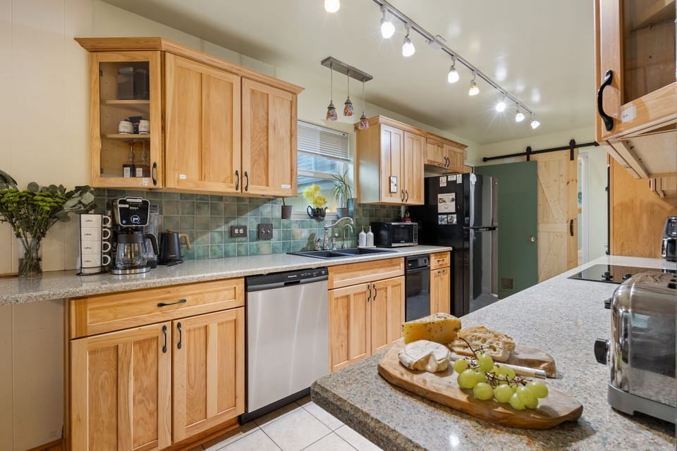 Fully Equipped kitchen with a coffee station, generous counter space and everything you need to entertain at home with family and friends. 