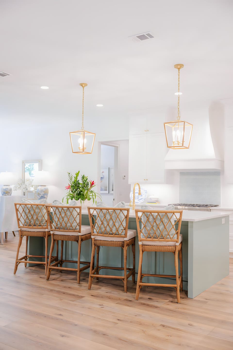 Chef's kitchen with bar seating for four.