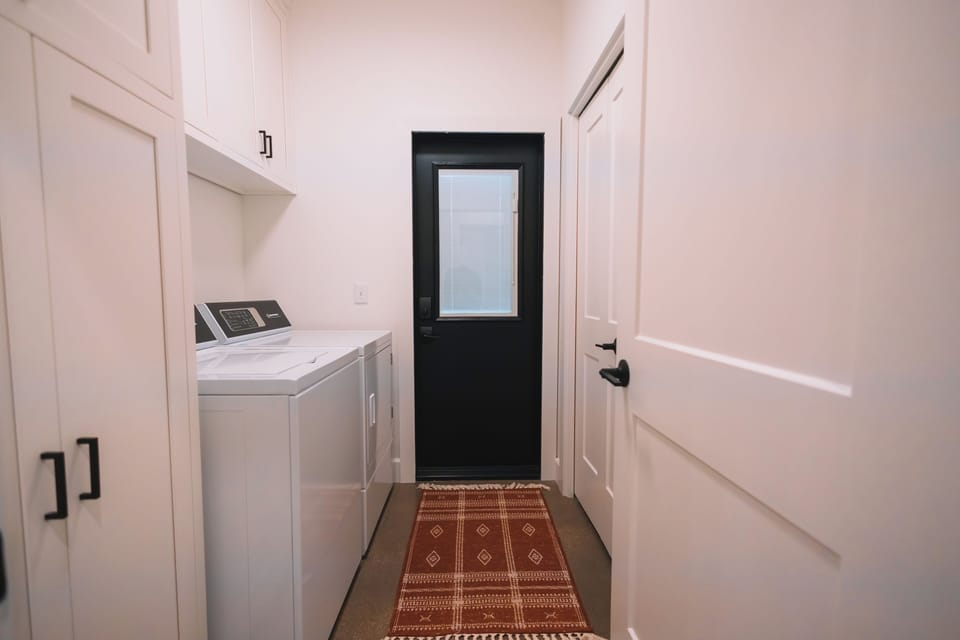 Laundry space with detergent provided.