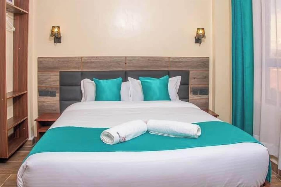 Standard Double Room, City View | WiFi (free), bed sheets