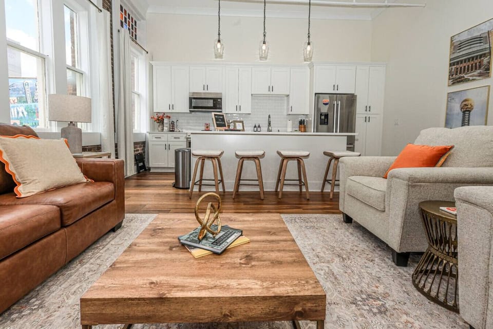 Living Room: Bright open space with modern decor, perfect for gathering and creating memories!