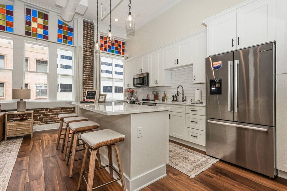 Kitchen: Bright, open space with vintage charm and stylish seating—perfect for culinary adventures!