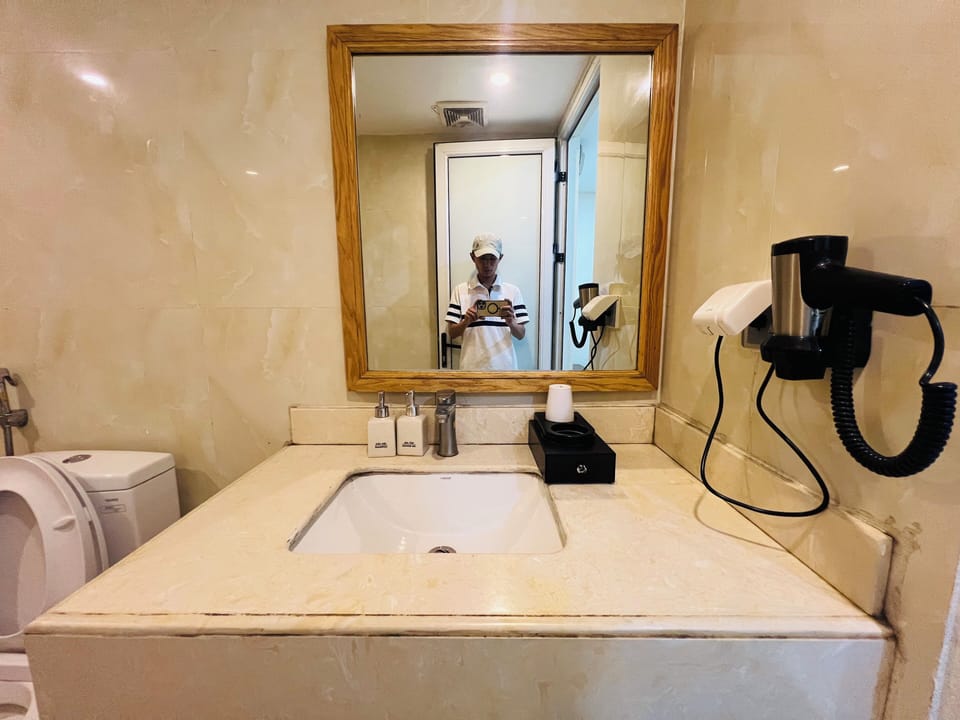 Shower, rainfall showerhead, eco-friendly toiletries, hair dryer