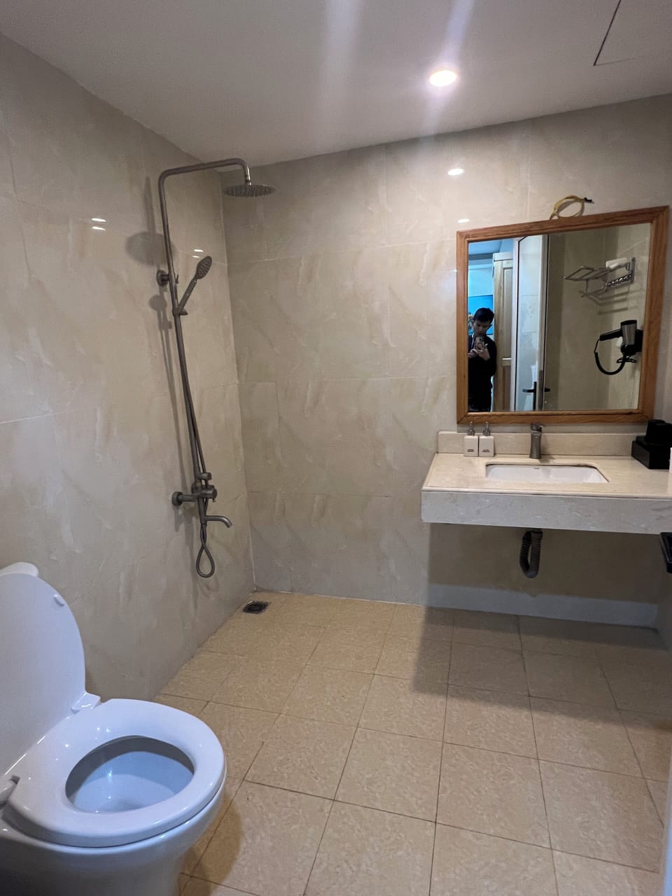 Shower, rainfall showerhead, eco-friendly toiletries, hair dryer
