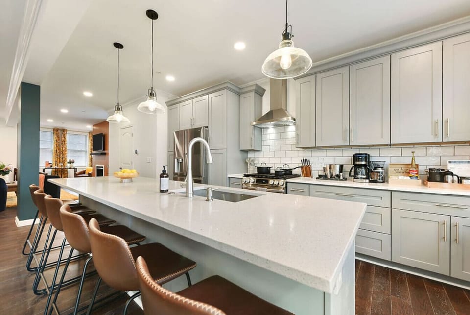 Fully equipped with top-of-the-line appliances and sleek countertops for all your culinary adventures.