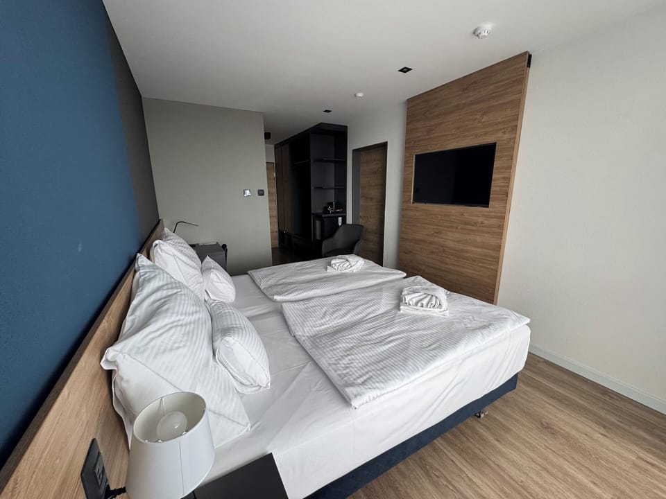 Superior Double Room, City View | In-room safe, desk, laptop workspace, blackout drapes