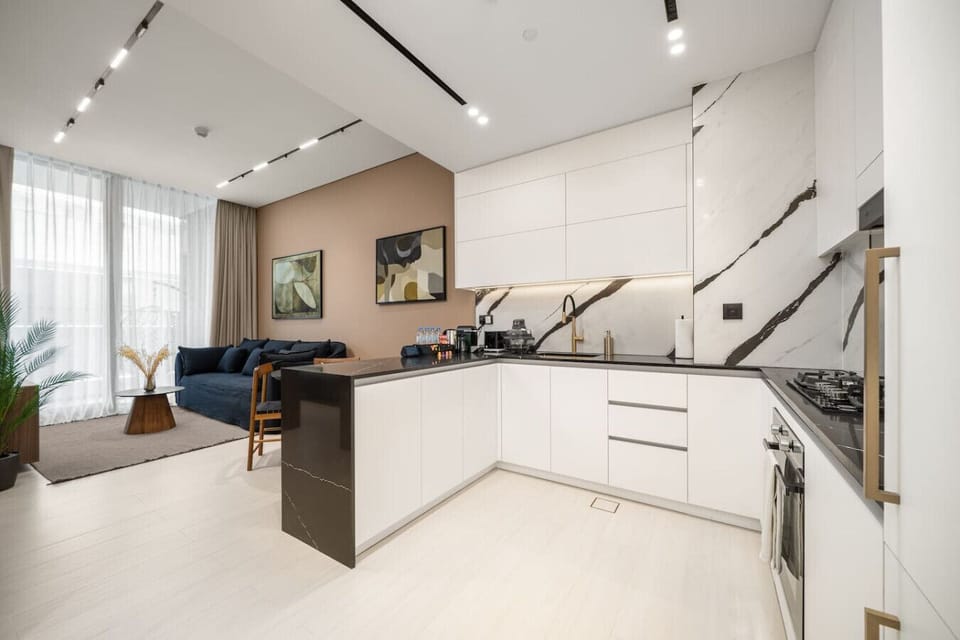 A bright and spacious kitchen showcasing modern appliances, perfect for whipping up meals and entertaining