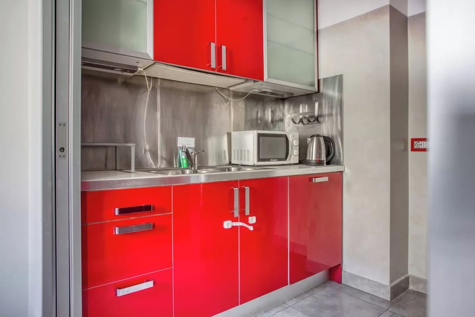 Apartment, 1 Double Bed with Sofa bed, Terrace | Private kitchen | Espresso maker, electric kettle, dining tables