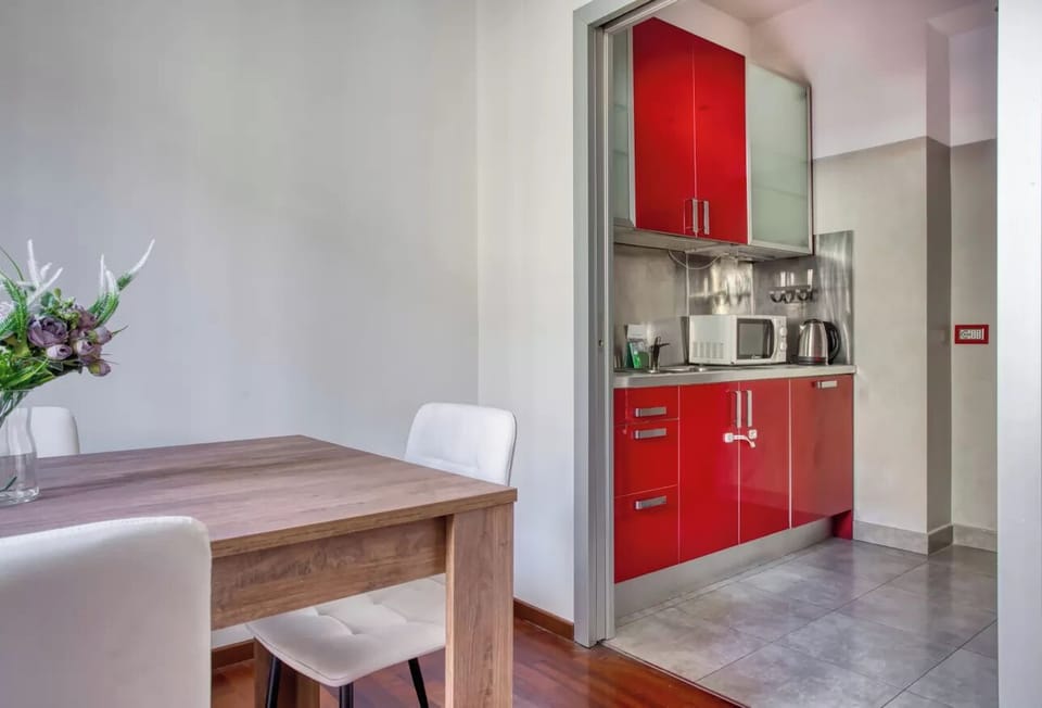 Apartment, 1 Double Bed with Sofa bed, Terrace | Private kitchen | Espresso maker, electric kettle, dining tables