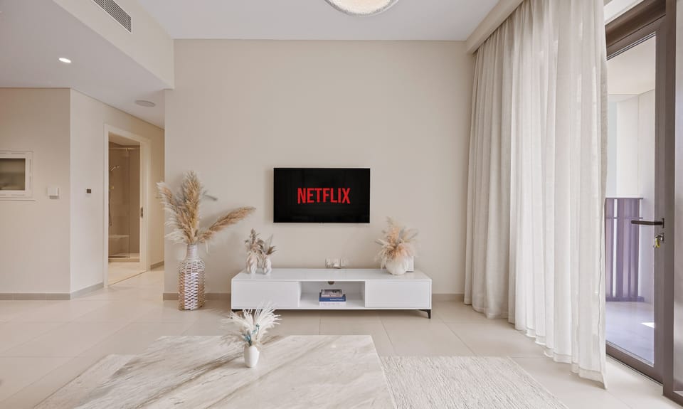 Classic Apartment, Balcony, Pool View | Living area | 55-inch Smart TV with digital channels, Netflix, streaming services