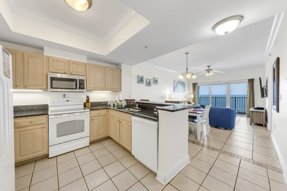 Signature Condo, 2 Bedrooms, Balcony, Beachside | Private kitchen | Coffee/tea maker, fridge, microwave, oven