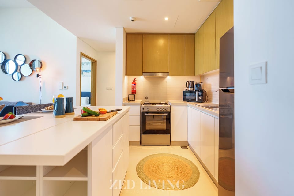 Deluxe Apartment, Sea View | Private kitchen | Full-size fridge, microwave, oven, stovetop