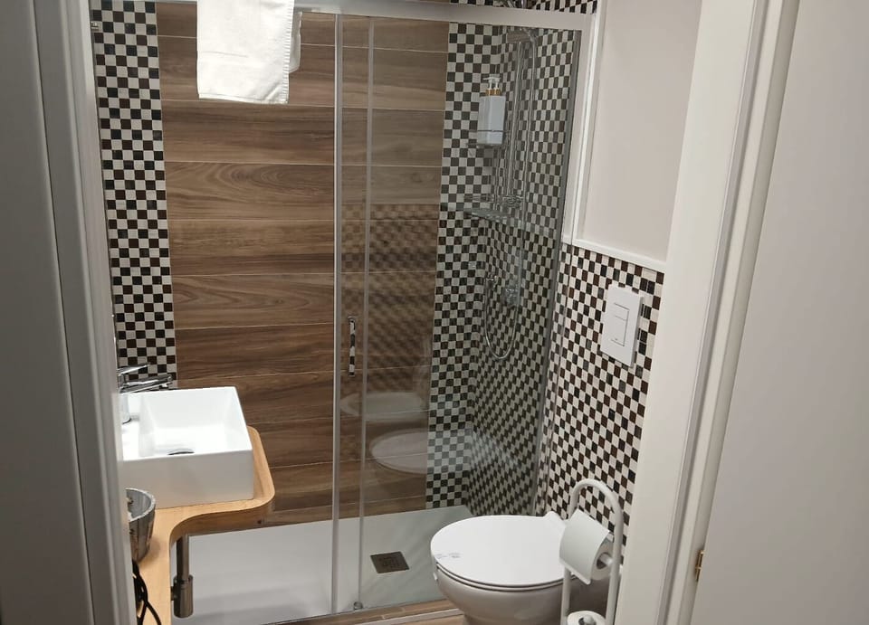 Double or Twin Room | Bathroom | Shower, hair dryer, bathrobes, slippers